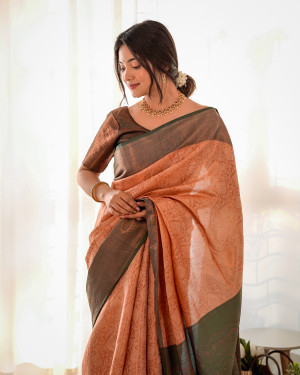 Peach color kanjivaram silk saree with zari weaving work