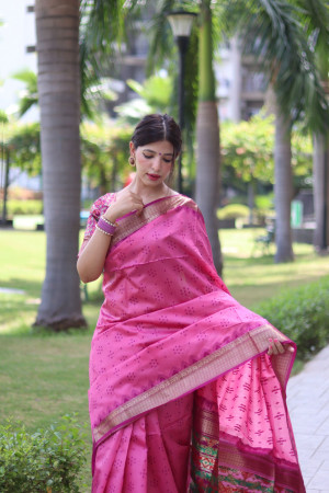 Pink color tussar silk saree with patola weaving design