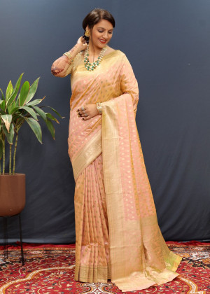 Light peach color banarasi silk saree with zari weaving work