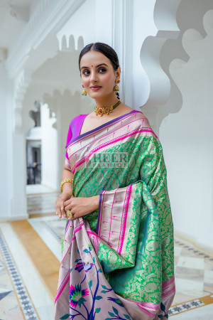 Sea green color paithani silk saree with zari weaving work