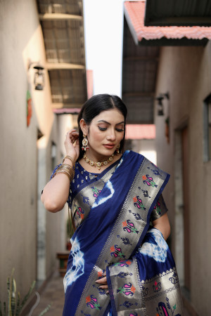 Navy blue color soft dola silk saree with shibori print & zari weaving work