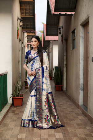 Navy blue color dola silk saree with shibori print & zari weaving work