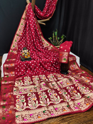 Red color hand bandhej silk saree with zari weaving work