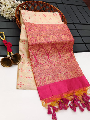 Off white color tussar silk saree with bandhani weaving work