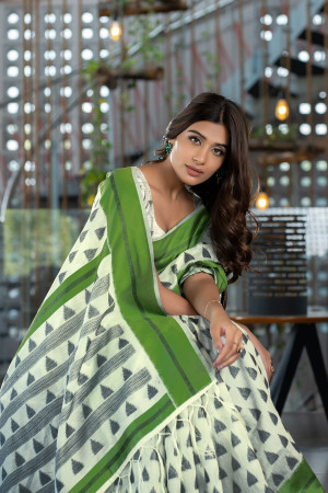 Green color soft handloom cotton saree with woven design