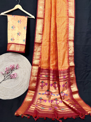 Orange color tussar silk saree with bandhani weaving work