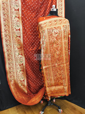 Orange color bandhej silk saree with meenakari weaving work