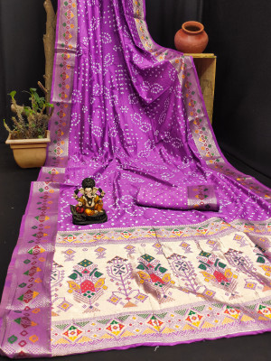 Purple color hand bandhej silk saree with meenakari weaving work