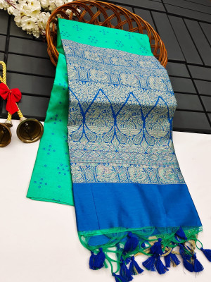 Sea green color tussar silk saree with bandhani weaving work