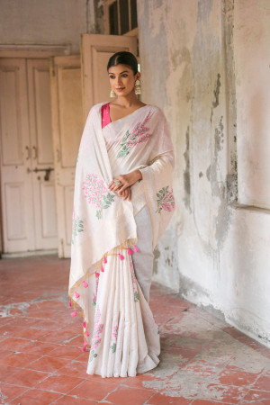 Off white color soft muga silk saree with weaving work