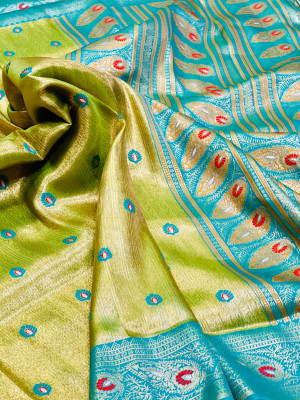 Parrot green color soft tissue paithani silk saree with zari weaving work