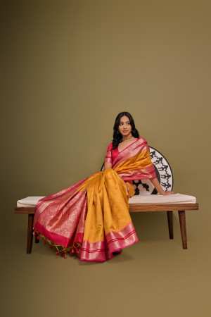 Mustard yellow color tussar silk saree with bandhani weaving work
