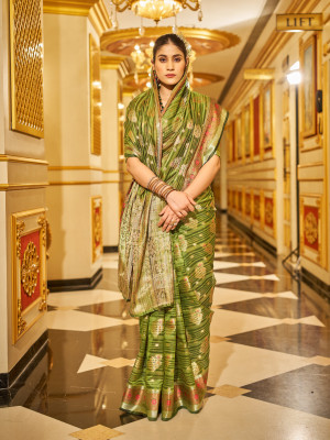 Mahendi green color soft organza silk saree with zari weaving work
