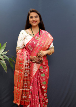 Pink color soft patola silk saree with zari weaving work