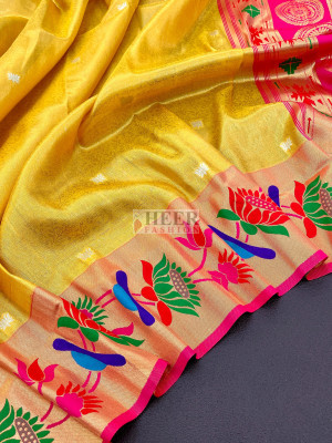 Yellow color soft tissue paithani silk saree with zari weaving work