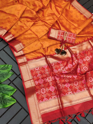 Orange color tussar silk saree with weaving work