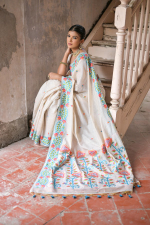 Off white color soft muga cotton saree with floral weaving work