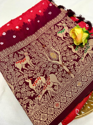 Gajari and magenta color bandhej silk saree with meenakari weaving work