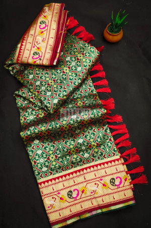 Green color patola silk saree with zari weaving work