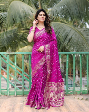 Purple color hand bandhej saree with zari weaving work