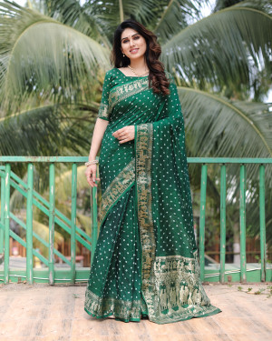 Green color hand bandhej saree with zari weaving work