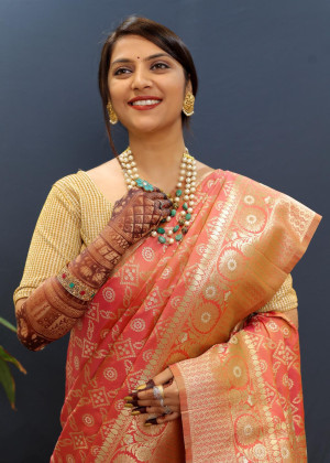 Peach color banarasi silk saree with zari weaving work