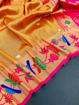 Orange color soft tissue paithani silk saree with zari weaving work