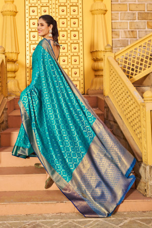 Rama green color patola silk saree with woven design