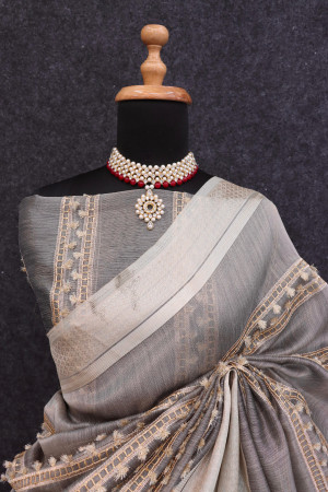 Gray color soft tussar silk saree with zari weaving work