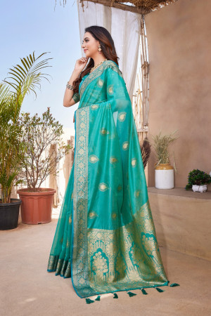Rama green color organza silk saree with zari weaving work