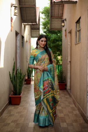 Yellow and rama green color dola silk saree with kalamkari printed work