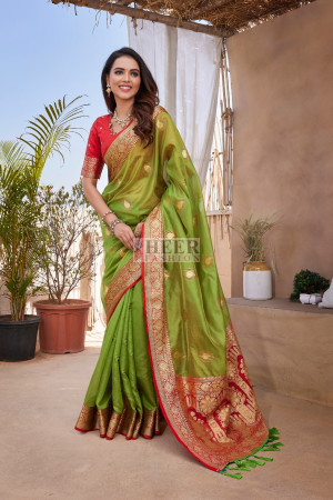 Green color organza silk saree with zari weaving work