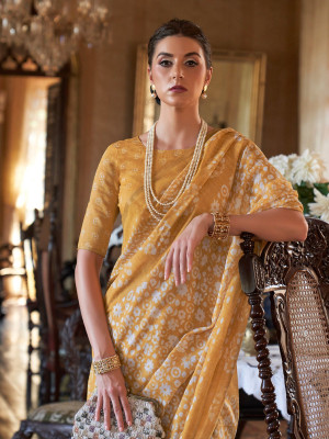 Yellow color soft mulmul cotton saree with batik printed work