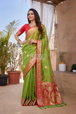 Green color organza silk saree with zari weaving work