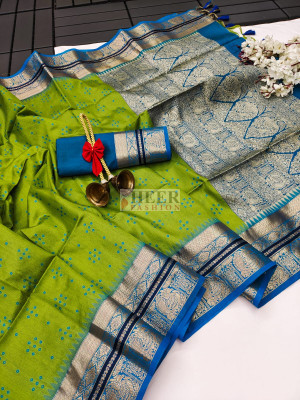 Mahendi green color tussar silk saree with bandhani weaving work