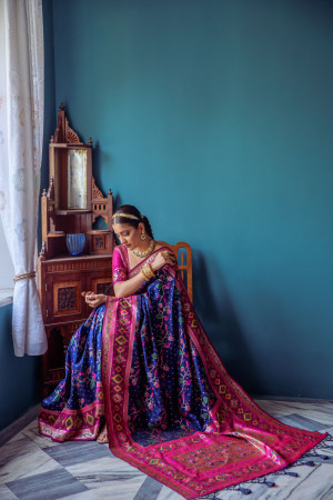 Navy blue color soft paithani patola silk saree with zari weaving work