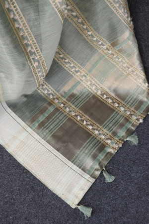 Pista green color soft tussar silk saree with zari weaving work