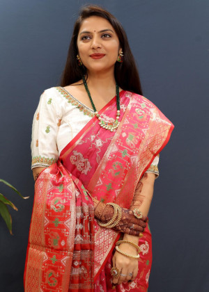 Pink color soft patola silk saree with zari weaving work