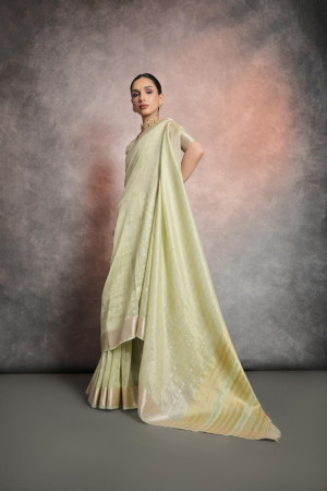 Light pista green color mulberry silk saree with zari weaving work