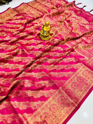 Rani pink color organza silk saree with zari weaving work