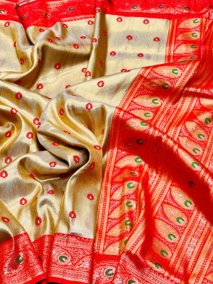 Off white color soft tissue paithani silk saree with zari weaving work
