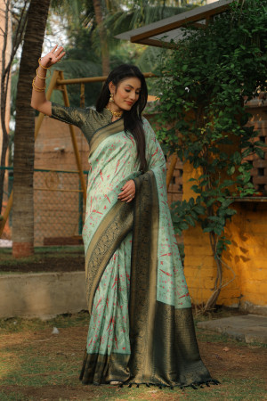 Sea green color kanjivaram silk saree with zari weaving work