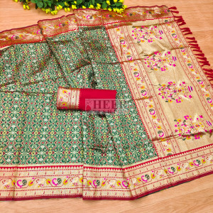 Green color patola silk saree with zari weaving work