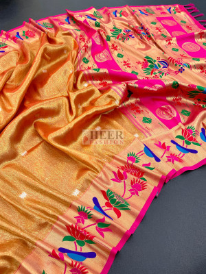 Orange color soft tissue paithani silk saree with zari weaving work