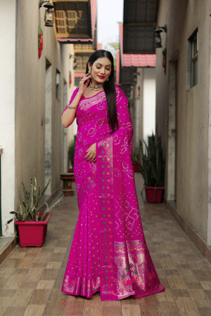 Pink color hand bandhej silk saree with meenakari weaving work