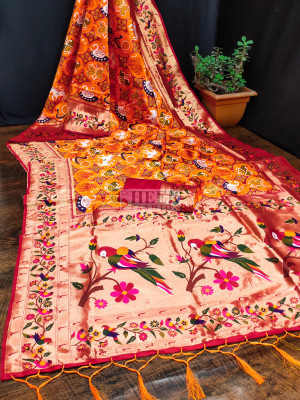 Orange color paithani silk saree with zari weaving work