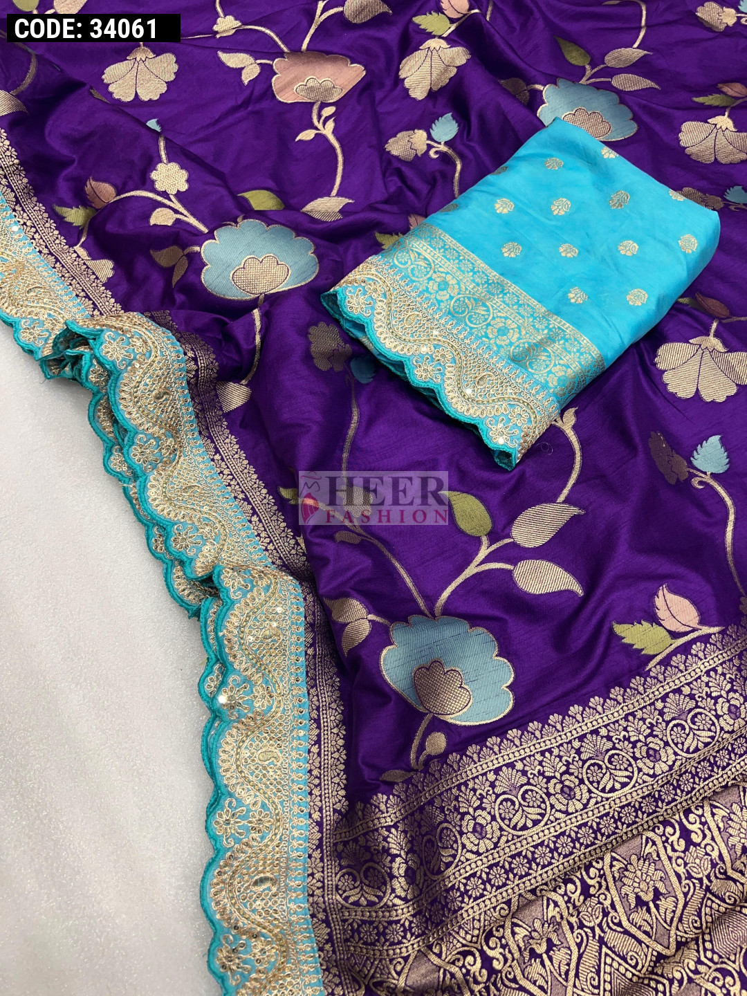 purple-color-dola-silk-saree-with-zari-weaving-work