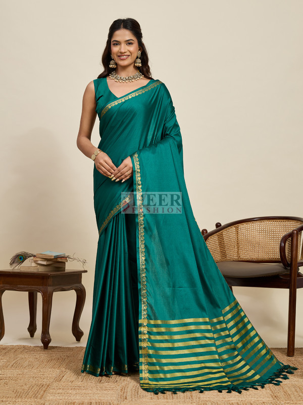 Rama green color soft silk banarasi saree with zari work border