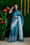 Firoji color lichi silk weaving saree with zari work