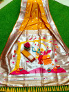Mustard yellow color paithani silk saree with silver zari work